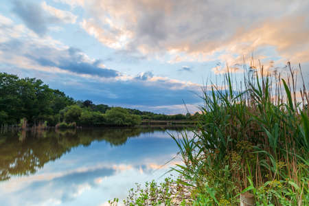 Mill Park and Mill Pond in Bracknell, Berkshire. Sunset, golden hour, long time exposure.の写真素材