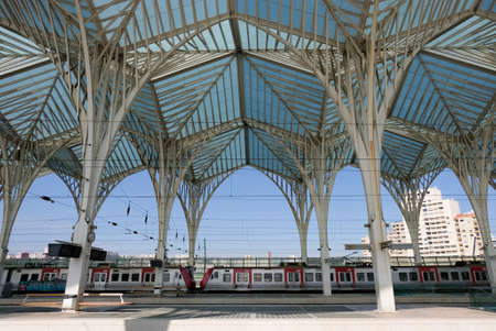 The Oriente Train Station (Gare do Oriente) in Lisbon,Portugal designed by famous architect  Santiago Calatrava, built in 1998. Train station with train stop in the front.のeditorial素材