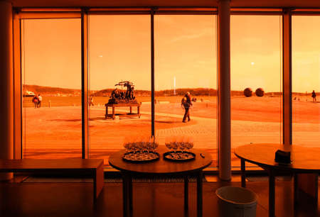 Interior space Astrup Fearnley Museum of Modern Art in Oslo, Norway designed by famous architect Renzo Piano.Interior view looking through orange glass.Modern art museum window.のeditorial素材
