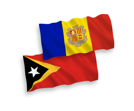 National vector fabric wave flags of East Timor and Andorra isolated on white background. 1 to 2 proportion.のイラスト素材