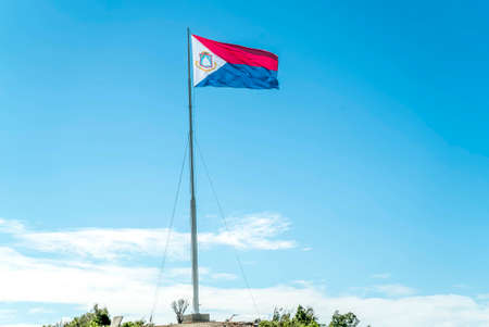 St.maarten flag flying high on top of a hillの写真素材