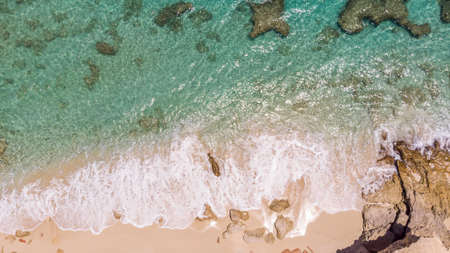 Scenic aerial view of white sandy beach. White sandy beach in cupecoy St.Maartenの写真素材