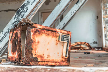 Rusty safe due to hurricane and natural damagesの写真素材