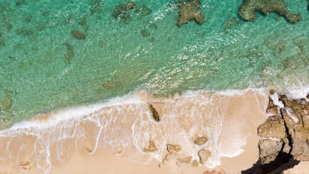 Scenic aerial view of white sandy beach. White sandy beach in cupecoy St.Maartenの写真素材