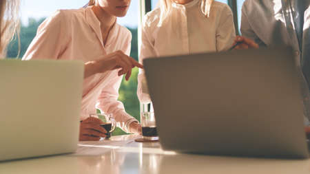 Cropped image of coworkers at business meetingの写真素材