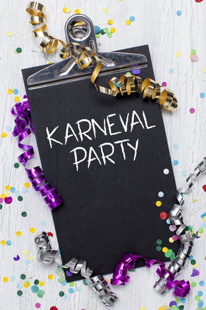 carnival confetti on wood backgroundの写真素材