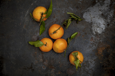 Fresh biology tangerines on black backgroundの写真素材