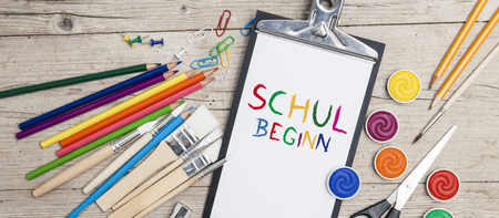 school accessories on a wooden backgroundの写真素材