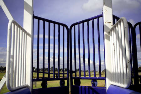 View from inside the starting stalls used in horse racingの写真素材