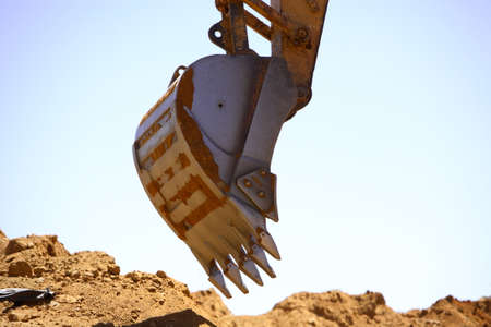 Close up view of a shovel of a excavator on a construction siteの写真素材
