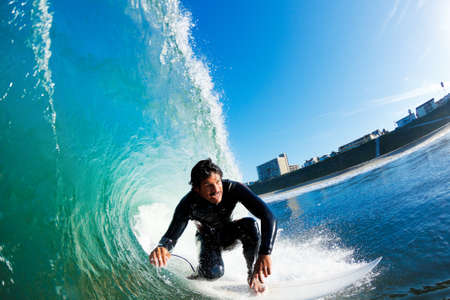 Surfer On Blue Ocean Waveの写真素材