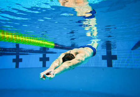 Swimmer in the Pool Underwater