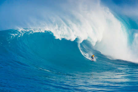 MAUI, HI - MARCH 13: Professional surfer Yuri Soledade rides a giant wave at the legendary big wave surf break known as "Jaws" during one the largest swells of the winter March 13, 2011 in Maui, HI.のeditorial素材