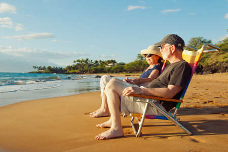 Happy Romantic Couple Enjoying Beautiful Sunset at the Beach