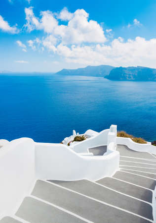 Santorini Island, Greece, Beautiful View of Blue Ocean and Traditional Dome Church Architecture の写真素材