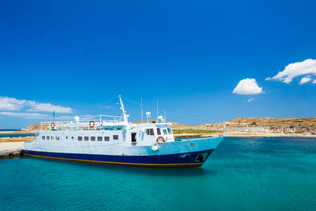 Boat in Tropical Harbor on Island