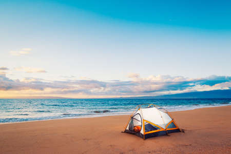 Camping on the Beach at Sunsetの写真素材