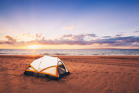 Camping on the Beach at Sunsetの写真素材