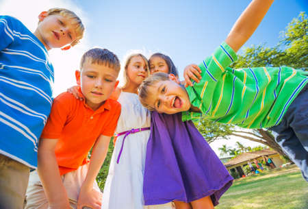 Group of Happy Kids Playing Together Outside, Friendship Concept