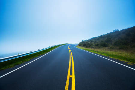 Road into the Fog at Duskの写真素材