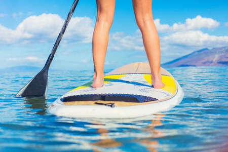 Attractive Young Woman Stand Up Paddle Surfing In Hawaii, Beautiful Tropical Ocean, Active Beach...