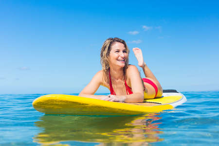 Attractive Young Woman Stand Up Paddle Surfing In Hawaii, Beautiful Tropical Ocean, Active Beach...