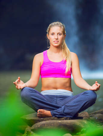 Beautiful Woman in Lotus Position, Yoga Zen Relaxationの写真素材