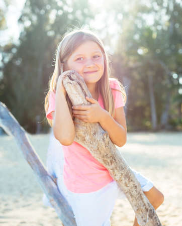 Adorable little girl at the beachの写真素材