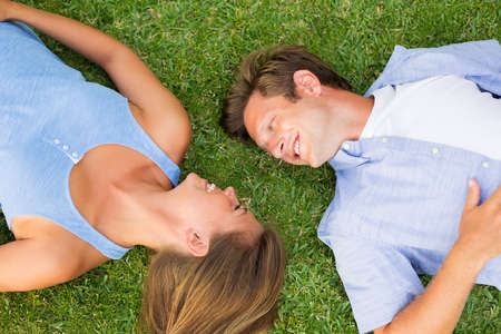 Portrait of happy young couple outside