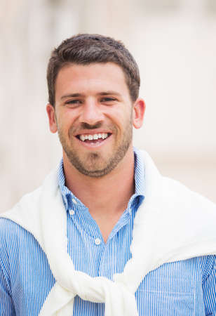 Portrait of young professional entrepreneur smiling. Confident, happy, and successful.の写真素材