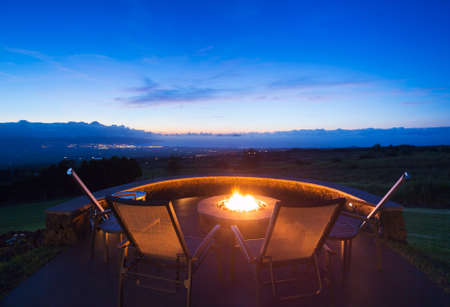Luxury backyard fire pit at sunsetの写真素材