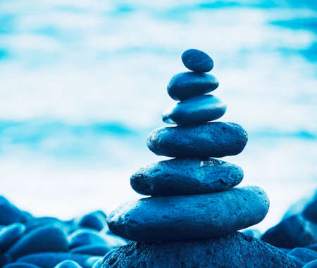 Stack of Round Smooth Stones on the Seashoreの写真素材