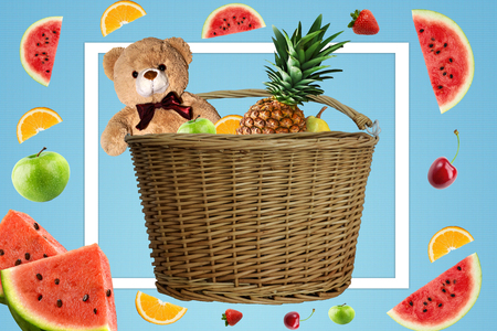 Picnic on a Sunny summer day, the picnic basket is filled with fruit. Daisies and the sun in the company of a Teddy bear on vacation. Toy and fruit in the basketの写真素材