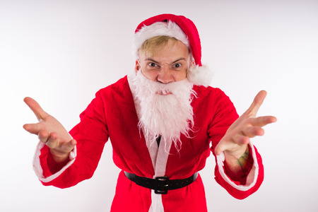 Emotional Santa Claus on a white background. Happy New Year and merry Christmas!の写真素材