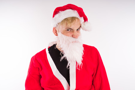Emotional Santa Claus on a white background. Happy New Year and merry Christmas!の写真素材