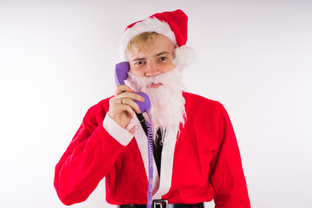 Emotional Santa Claus on a white background. Happy New Year and merry Christmas!の写真素材