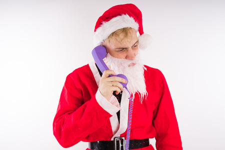 Emotional Santa Claus on a white background. Happy New Year and merry Christmas!の写真素材