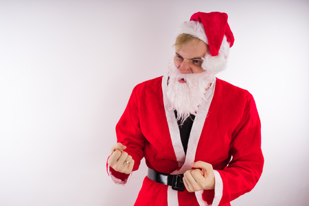 Emotional Santa Claus on a white background. Happy New Year and merry Christmas!の写真素材