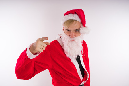 Emotional Santa Claus on a white background. Happy New Year and merry Christmas!の写真素材