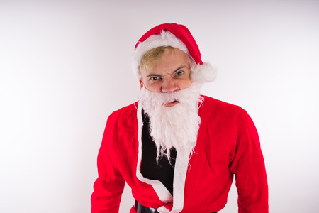 Emotional Santa Claus on a white background. Happy New Year and merry Christmas!の写真素材