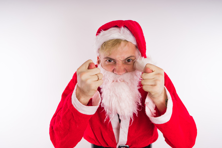Emotional Santa Claus on a white background. Happy New Year and merry Christmas!の写真素材