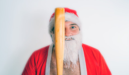 Thick emotional Santa Claus on plowing with bare torsoの写真素材