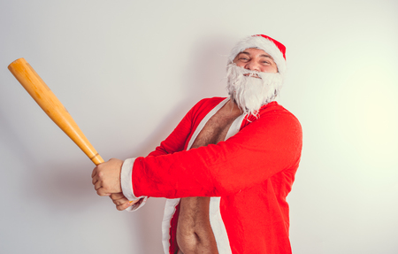 Thick emotional Santa Claus on plowing with bare torsoの写真素材