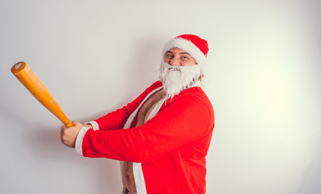 Thick emotional Santa Claus on plowing with bare torsoの写真素材