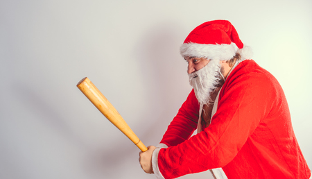 Thick emotional Santa Claus on plowing with bare torsoの写真素材