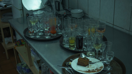 Lots of dirty dishes, after co-op or banquets. The concept of dirty cuisine in the restaurant.の写真素材