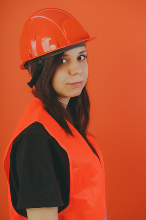 A girl is a road construction workerの写真素材
