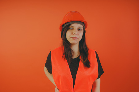 A girl is a road construction workerの写真素材
