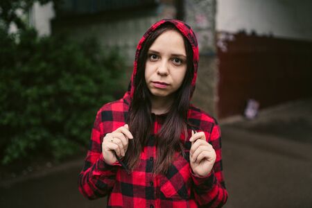 Portrait of young woman in casual clothes