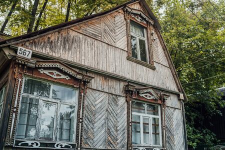 Village house in the forest in cloudy weather.の写真素材